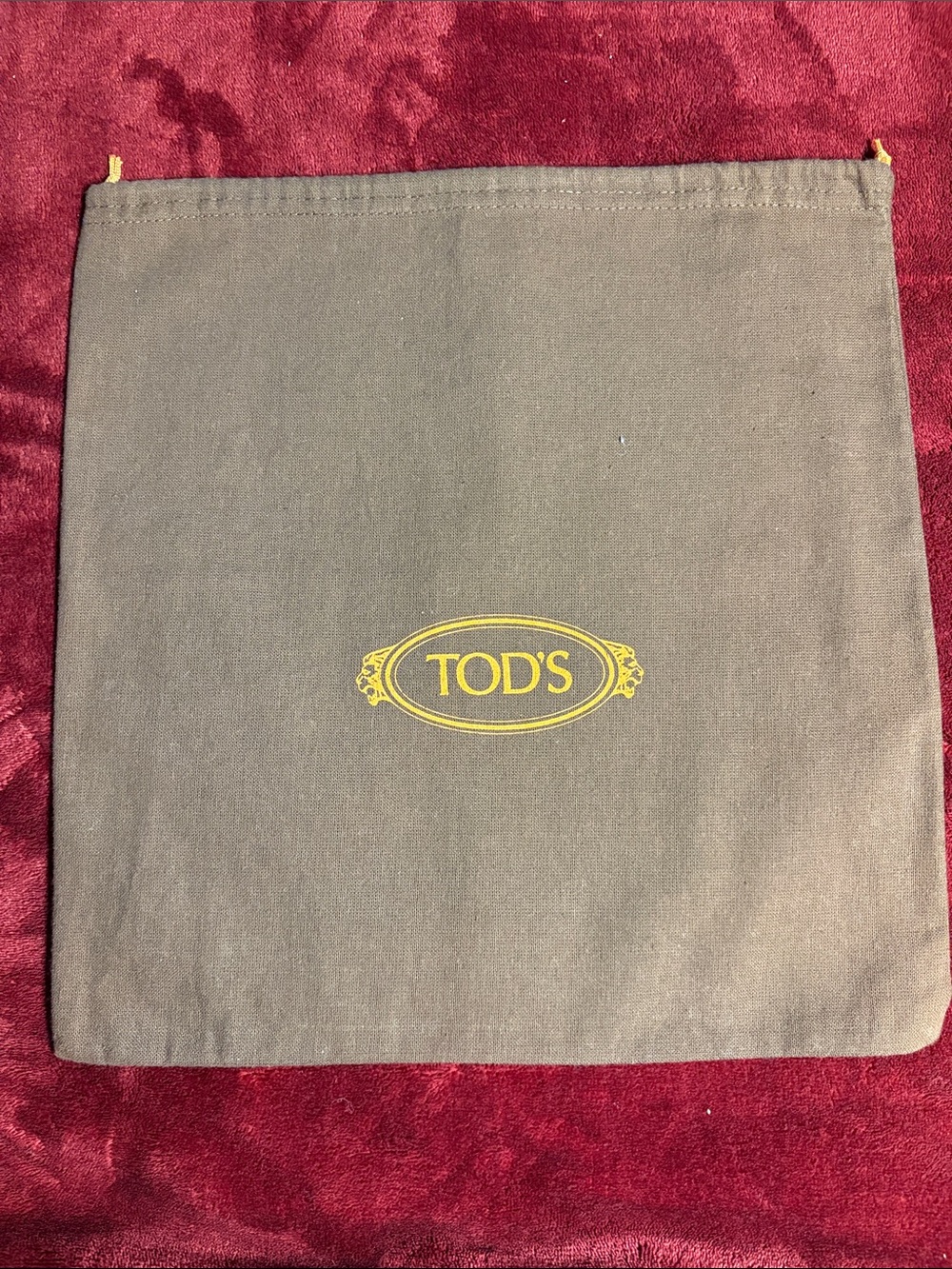 Tod's Brown Canvas Dust Bag with Yellow Logo